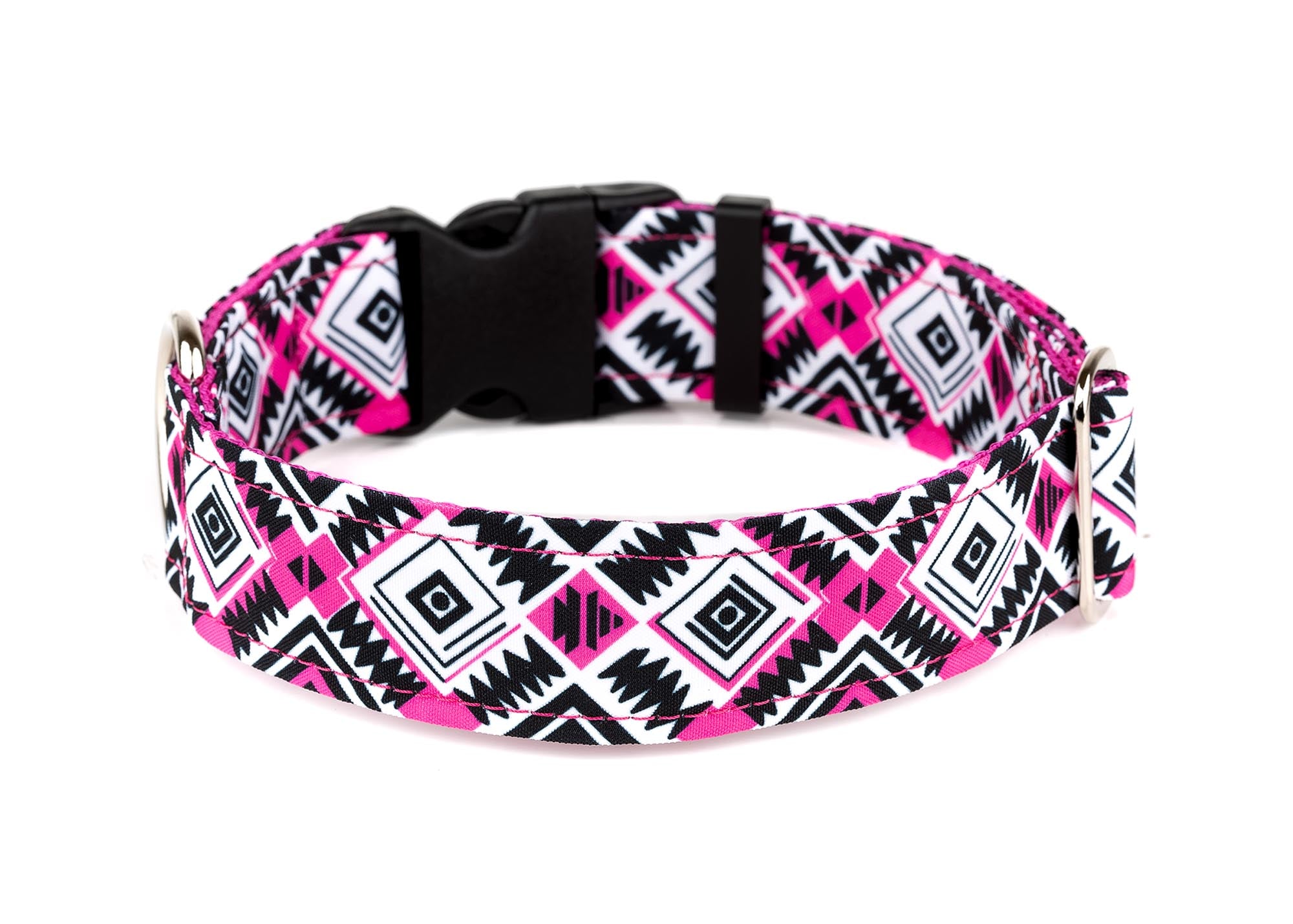 Dog collar with pink and black geometric aztec pattern on a white 